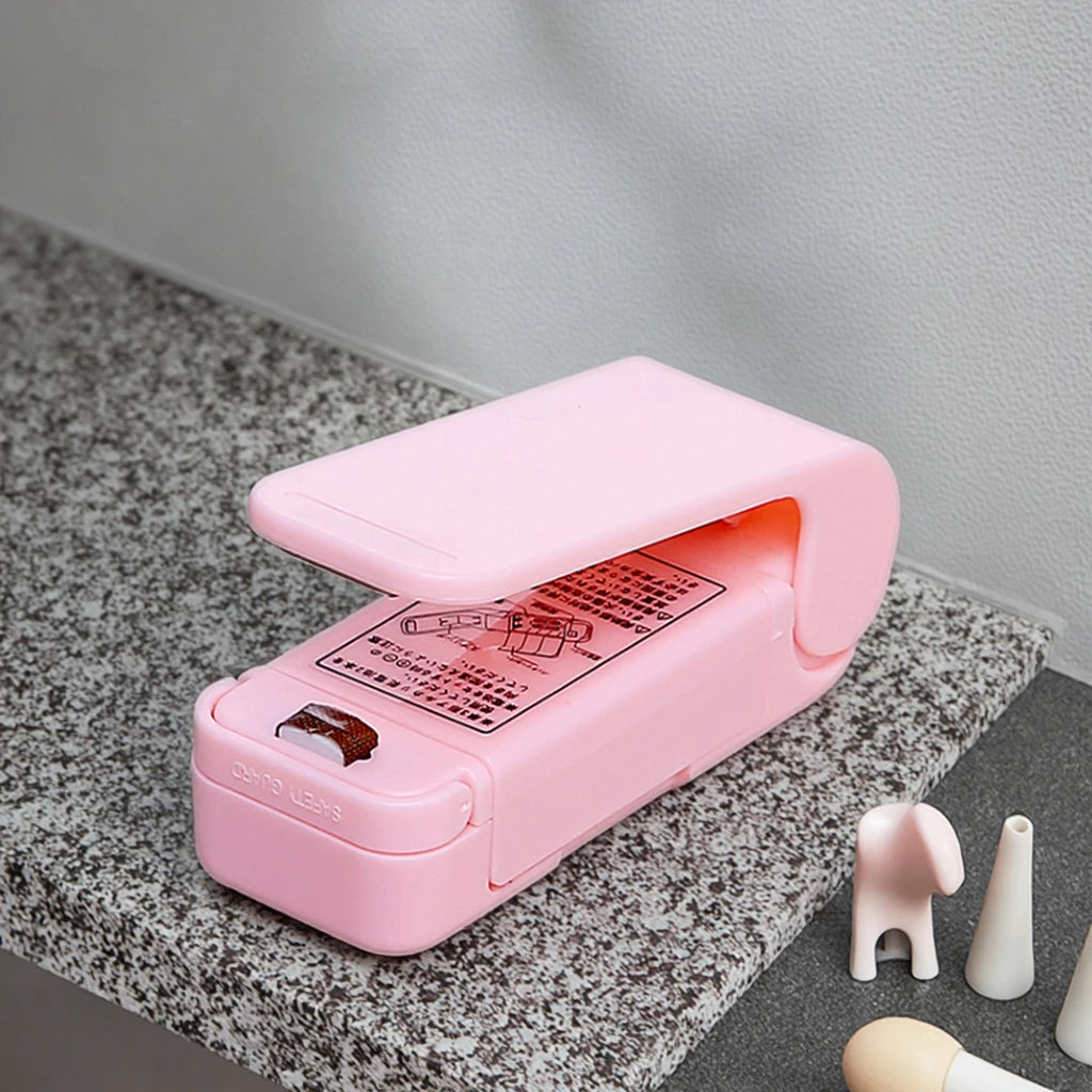 Portable Kitchen Mini Hand Pressure Heat Sealing Machine for Household Sundries for Sealing Food in Plastic Bags