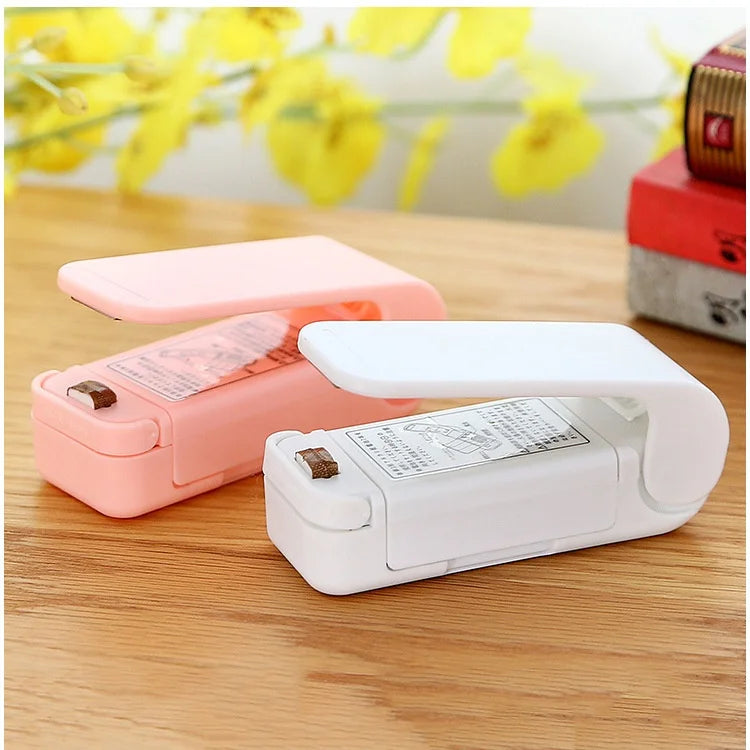Portable Kitchen Mini Hand Pressure Heat Sealing Machine for Household Sundries for Sealing Food in Plastic Bags